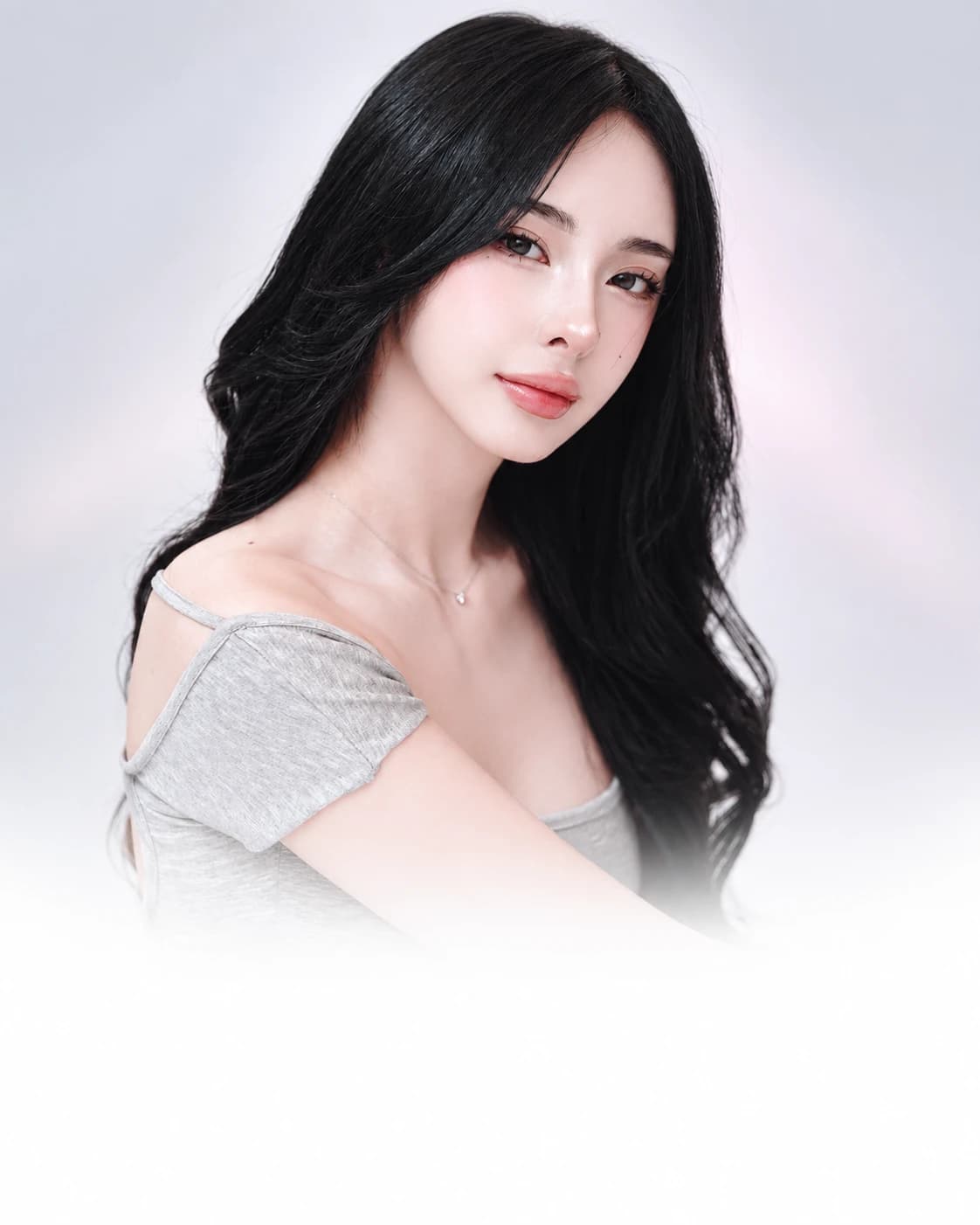 Portrait of Yuna wearing a gray outfit